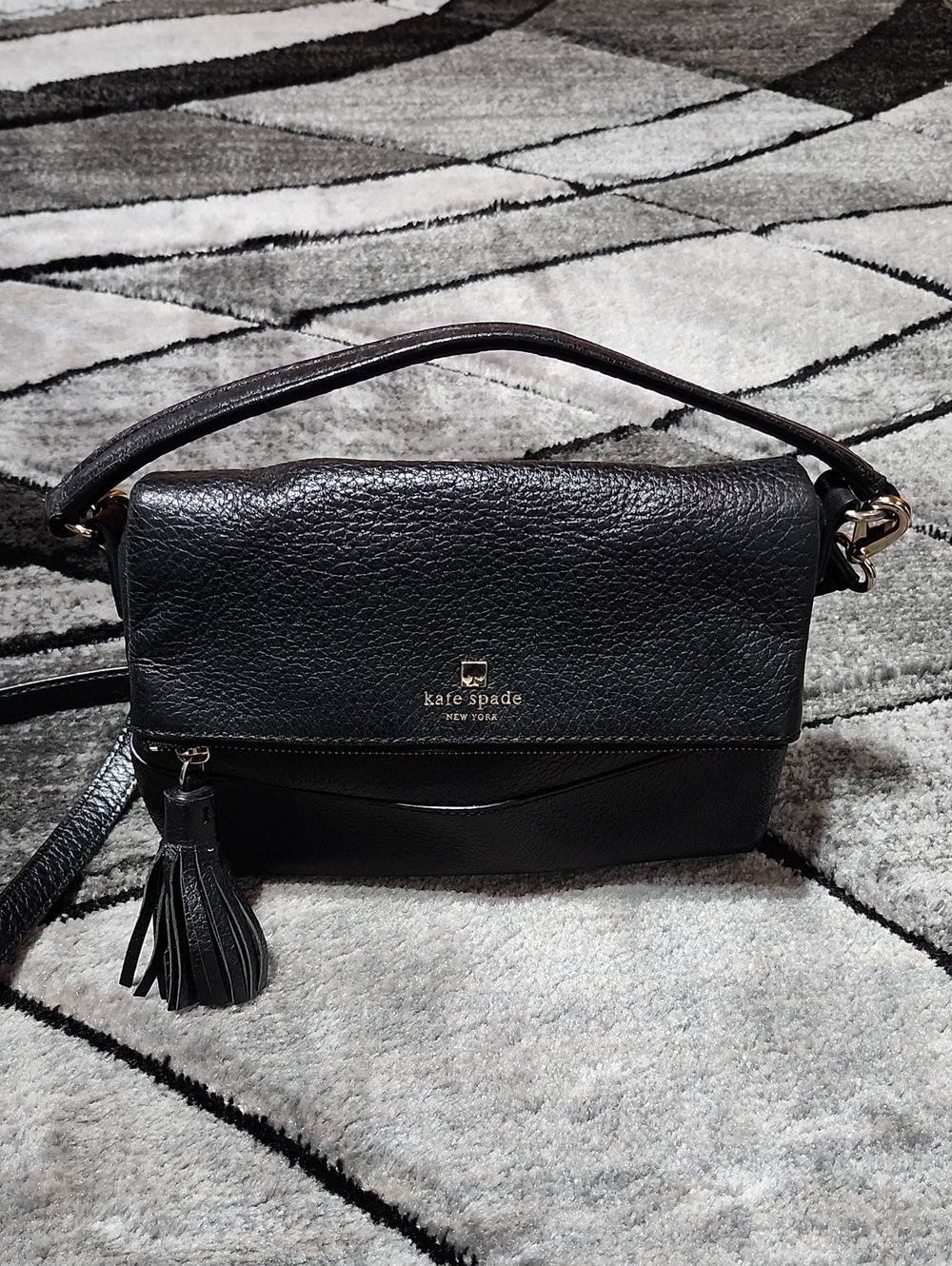 KATE SPADE SOUTHPORT AVENUE PEBBLED LEATHER FOLD-OVER TASSEL CROSSBODY PURSE